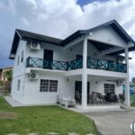 Bona Villa, Bon Accord, Tobago: the villa seen from the garden, with the pool to one side.
